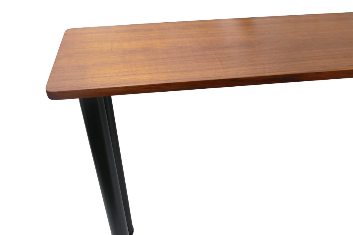 a wooden table with black metal legs on a white background