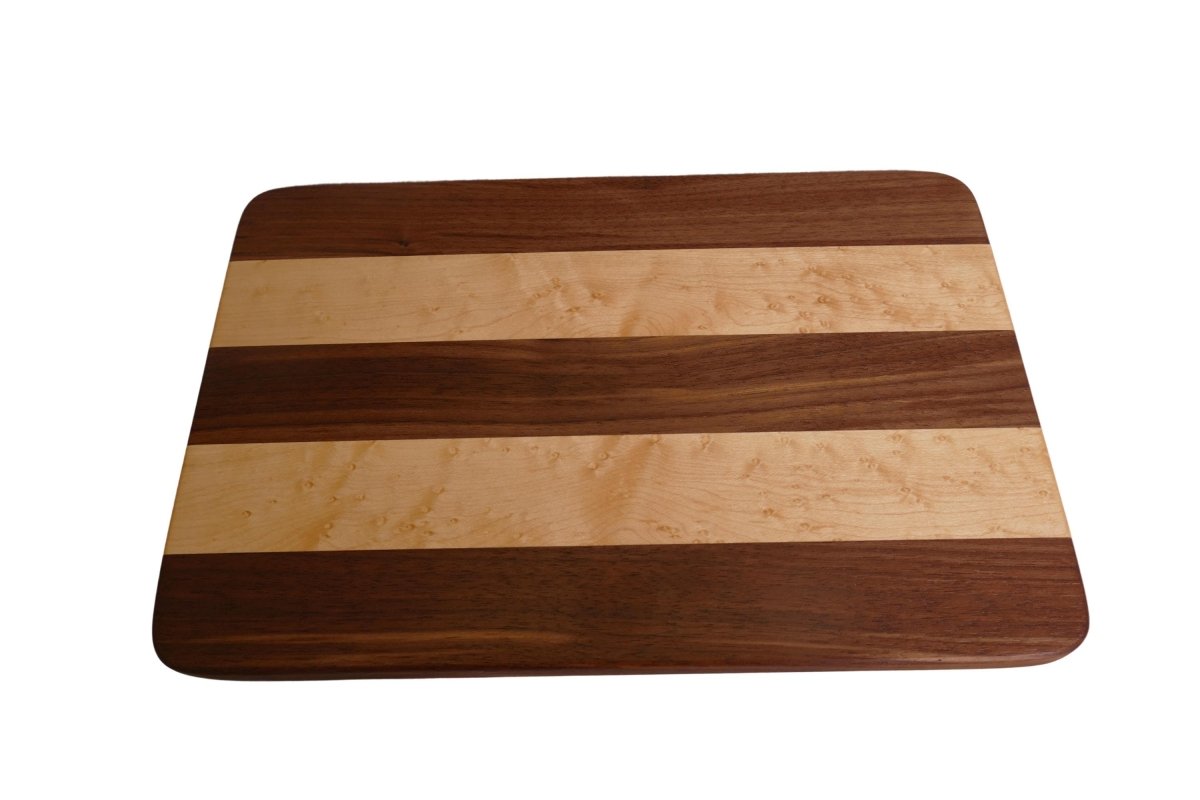 a wooden cutting board with a striped design
