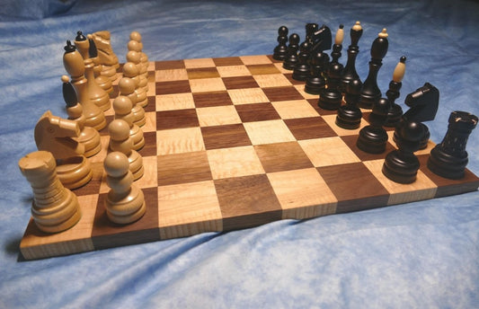 a wooden chess board with chess pieces on it