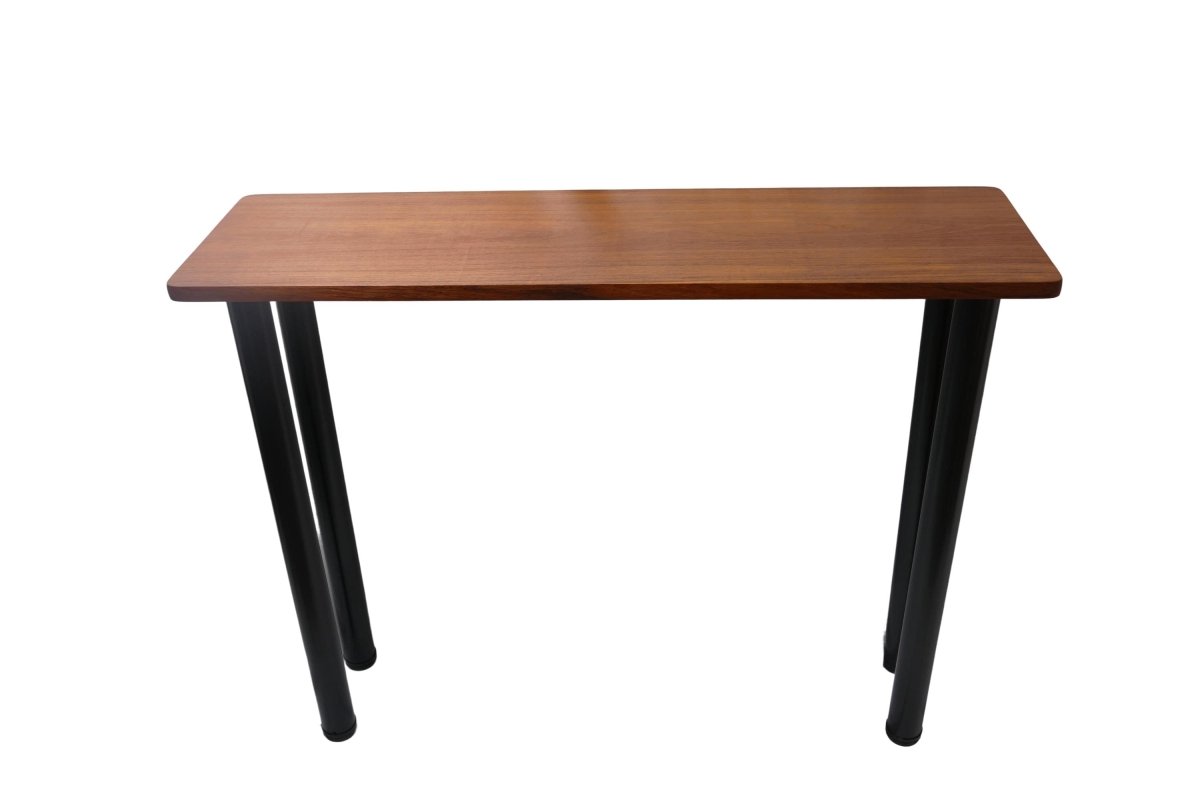 a wooden table sitting on top of a white backdrop