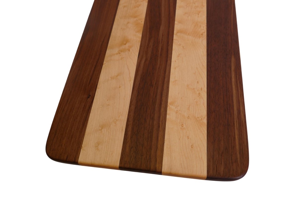 a wooden cutting board on a white background