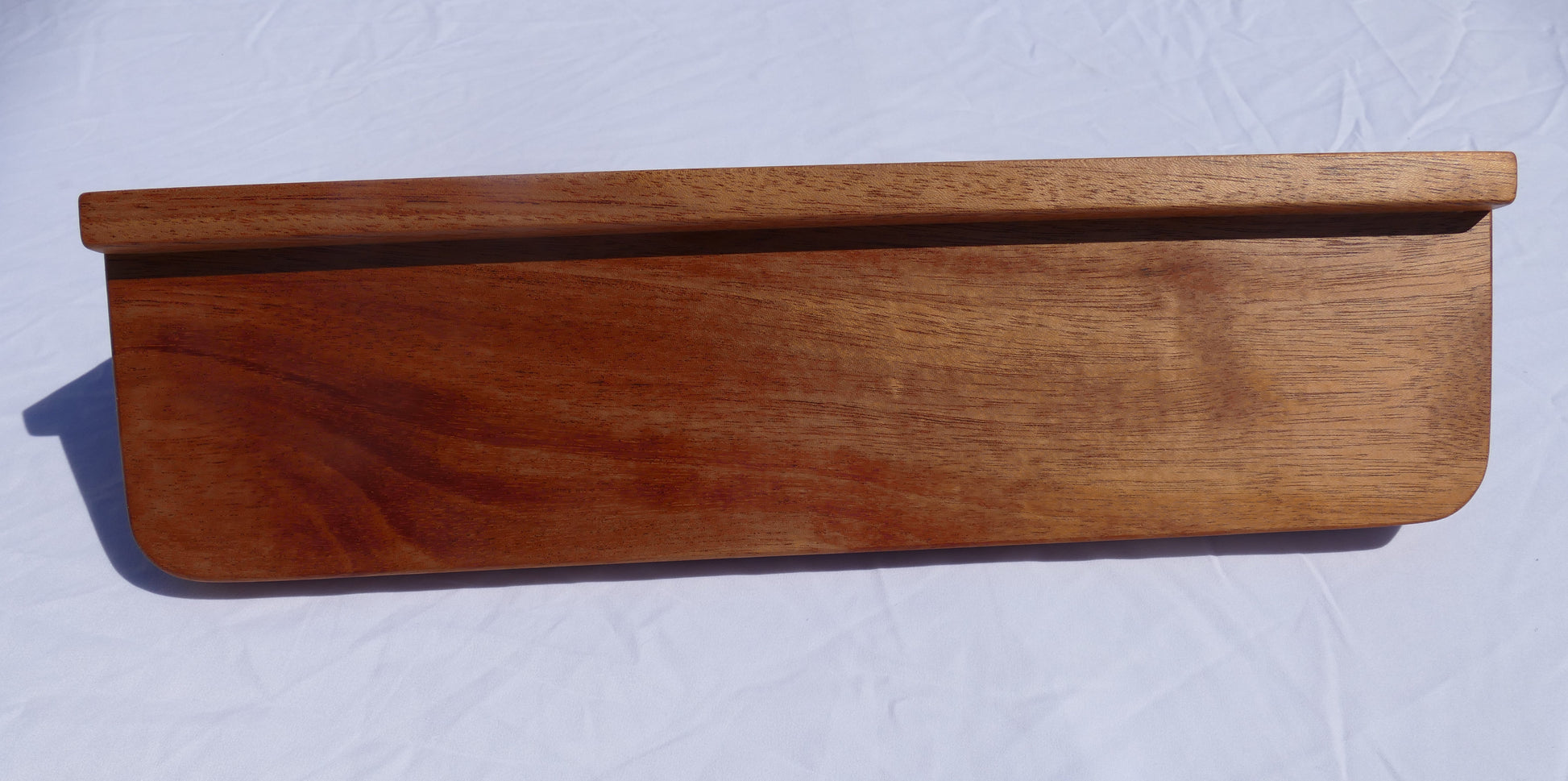 Mahogany coat rack with shelf and black coat hooks