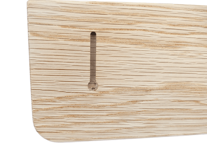 Keyhole on the back of a white oak coat rack