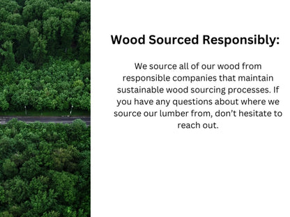 an aerial view of a road surrounded by trees