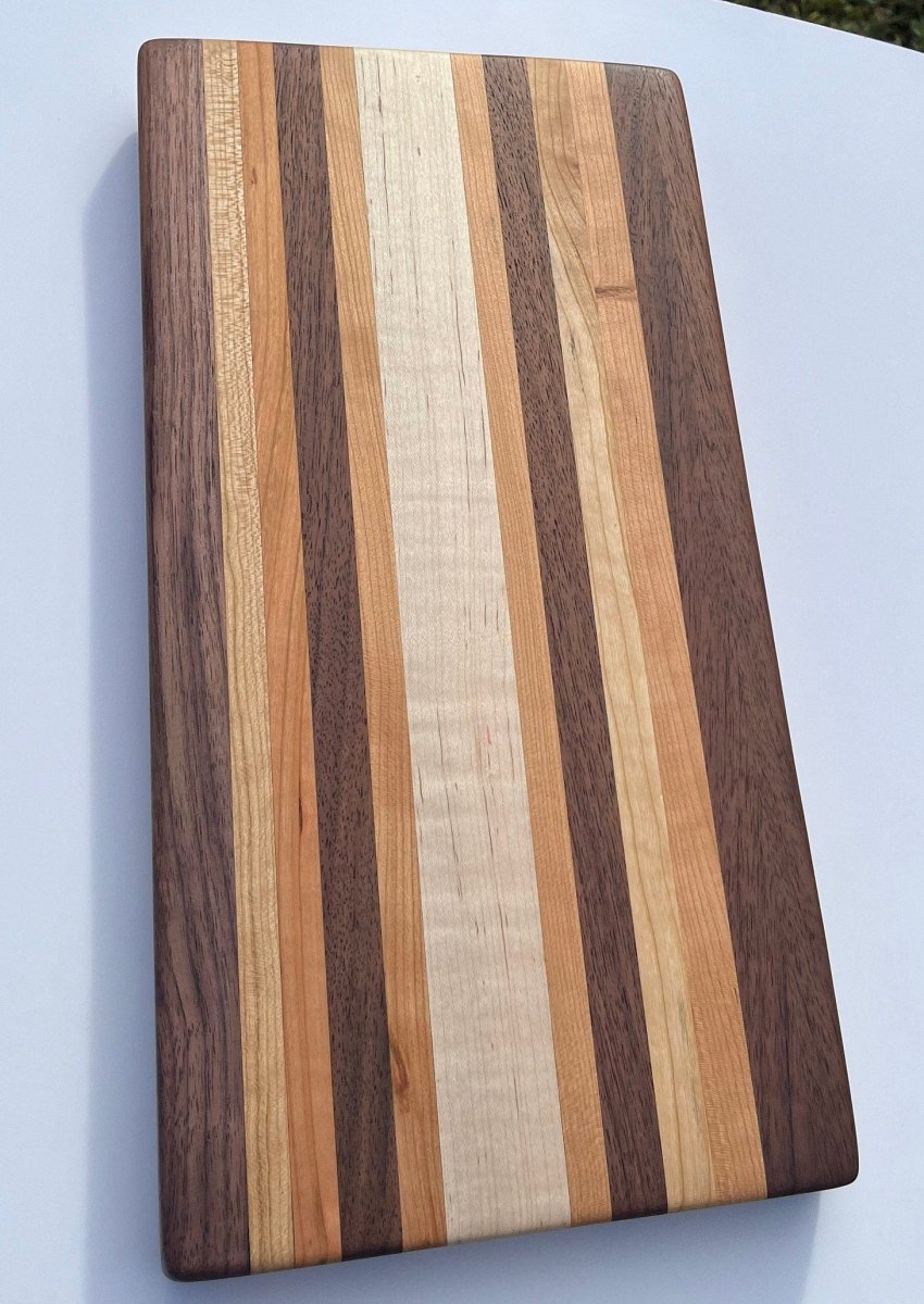 Edge Grain Cutting Board made of cherry, walnut, and curly soft maple - Woodwork & Design by AJ