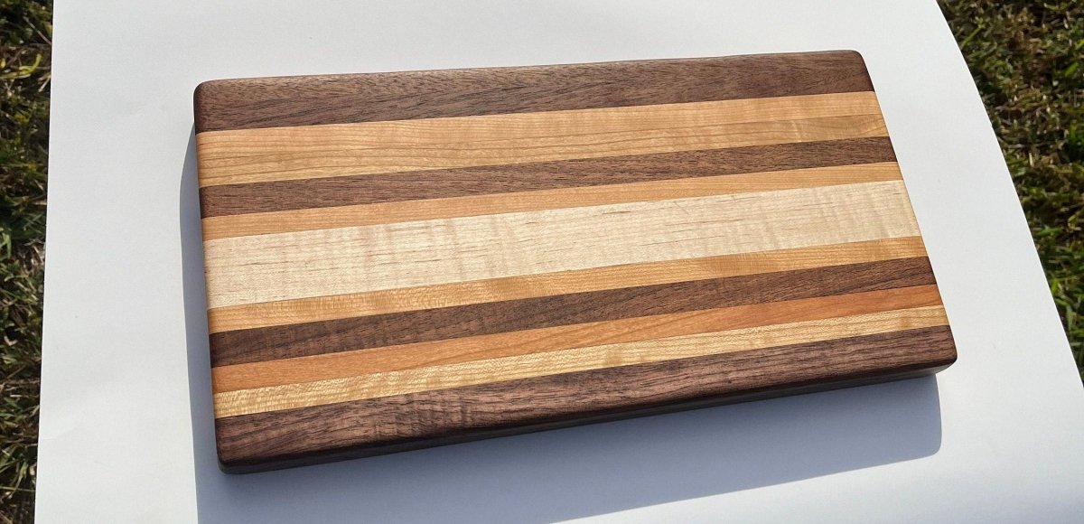 Edge Grain Cutting Board made of cherry, walnut, and curly soft maple - Woodwork & Design by AJ