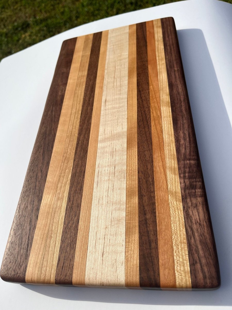 Edge Grain Cutting Board made of cherry, walnut, and curly soft maple - Woodwork & Design by AJ