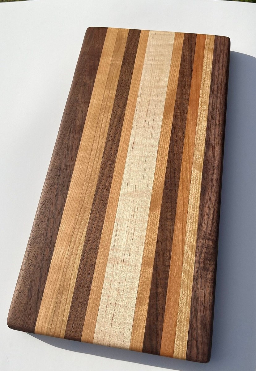 Edge Grain Cutting Board made of cherry, walnut, and curly soft maple - Woodwork & Design by AJ